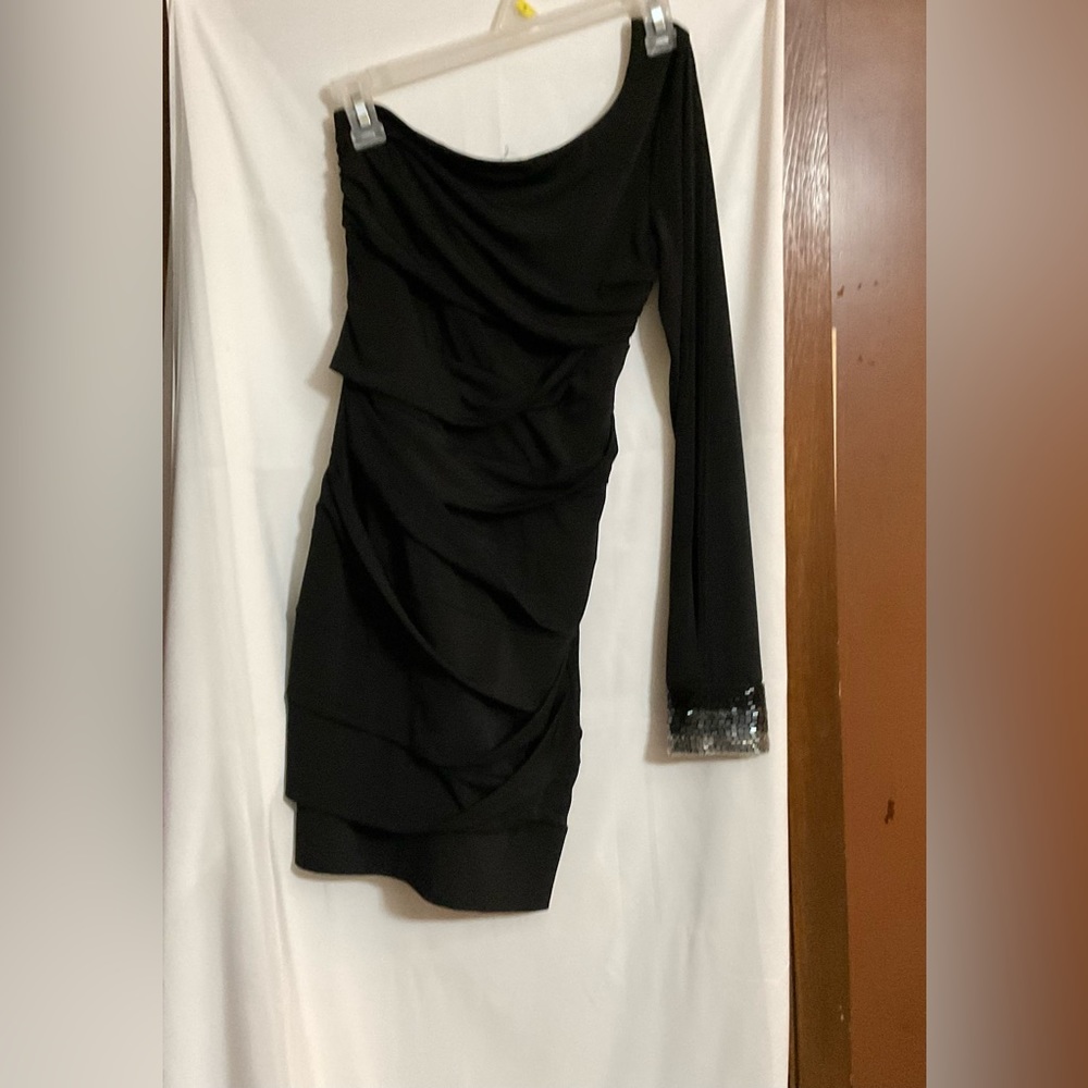 Emerald Sundae  one long sleeve size S black ruffled dress with sequins on wrist
